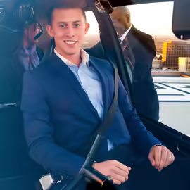 Man in blue suit buckled into helicopter